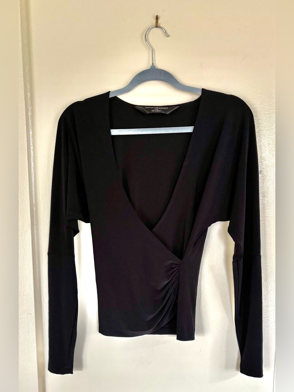 Norma Kamali Black Deep V Top with Satin Logo Tag and scrunched side
